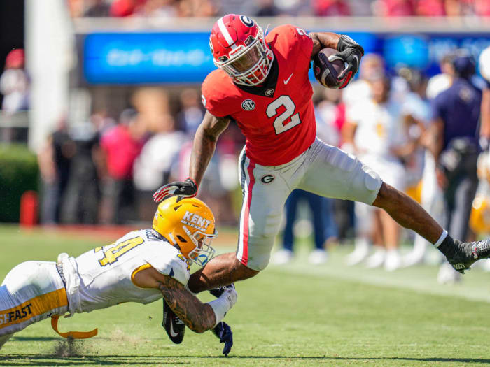 Georgia senior RB Kendall Milton (2) takes a rep during one of Georgia's 2023 spring practices. After missing time during the spring with a hamstring injury, Milton re-aggravated the injury early during fall camp.